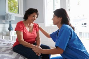 caregiver comforting challenging behavior in Alzheimer's senior