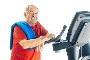 A senior adult is about to exercise to manage his Parkinson’s symptoms.