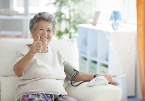 taking blood pressure at home - dementia care burlington