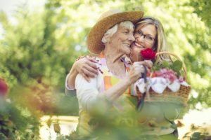 Family caregiving doing enriching activities with senior loved one