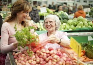 caregiver and senior grocery shopping